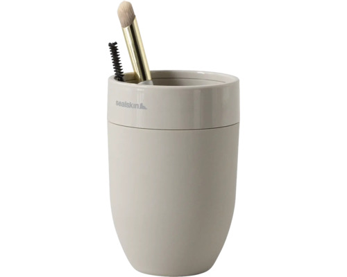 Sealskin tandenborstelbeker beige met matte en glanzende afwerking, gevuld met twee cosmeticakwastjes.