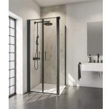 Moderne hoekdouche met vouwdeuren en douchesysteem in een lichte badkamer met wastafel.