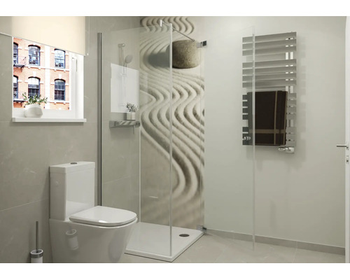 Moderne badkamer met inloopdouche van glas, wandtegel met zen motief, hangtoilet en een handdoekradiator.