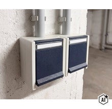 Twee opbouw lichtschakelaars naast elkaar gemonteerd met klapdeksel op een ruwe muur met kabelbuizen. (Image AI modified or generated)