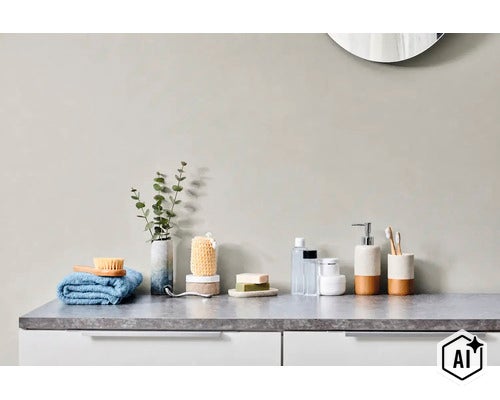 Badkamerinrichting met zeepdispenser tandenborstelbeker en badkameraccessoires op een aanrechtblad in natuursteenlook in een moderne badkamer (Image AI modified or generated)