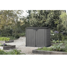 Kunststof tuinbox met dubbele deur voor opslag in de tuin staand op een grindpad voor tuinbedden