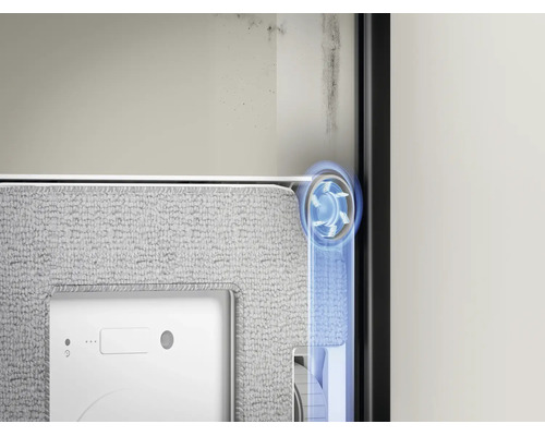 Detailweergave van een robotstofzuiger die randreiniging met een roterende zijborstel langs een muur laat zien.