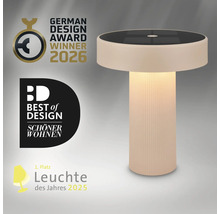 Moderne ronde LED tafellamp met geribbelde zuilvoet, bekroond met designprijzen.