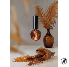 Moderne hanglamp met cilindrische houder en getinte glazen bol inclusief oplichtende led filament lichtbron. (Image AI modified or generated)