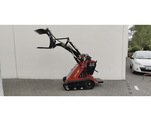 Compactlader met bak en rupsbanden