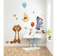 Wanddecoratie met Winnie de Poeh-motieven in de kinderkamer.