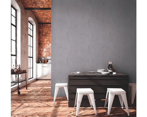 Eetgedeelte in loftstijl met houten vloer, eettafel, stoelen en keuken