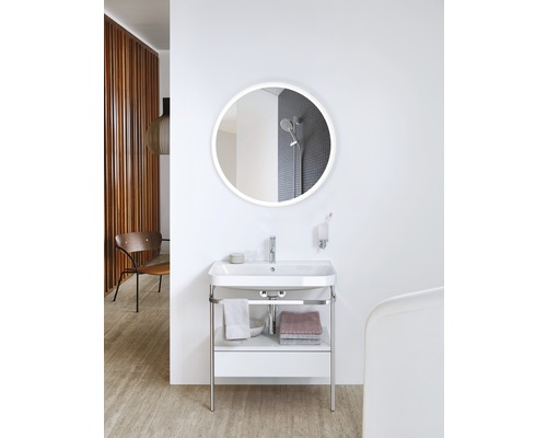 Badkamer met wastafelonderkast, opzetwastafel en ronde spiegel