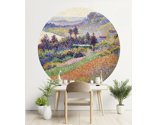 Ronde wanddecoratie met landschapsmotief boven bureau