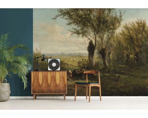 Wandafbeelding met landschapsschilderij in klassieke stijl, met boom, schapen en groene weide