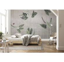 Lichte kamer met bed en fotobehang met plantmotieven