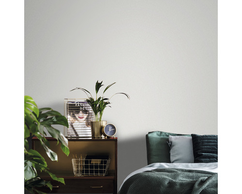 Slaapkamerscène met bed, nachtkastje en kamerplanten