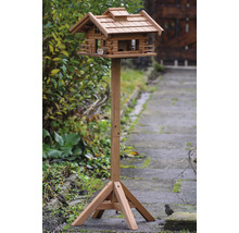 Vogelhuis in chaletstijl met standaard voor de tuin