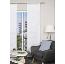 Woonkamer met schuifpanelen, fauteuil en bijzettafel