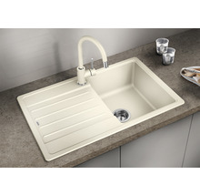 Beige spoelbak met afdruiprek en bijpassende kraan