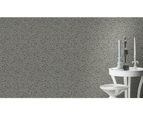 Grijs behang met abstract patroon op de muur