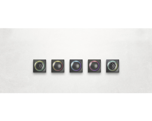 Vijf schakelaars en stopcontacten met cirkelvormige verlichting