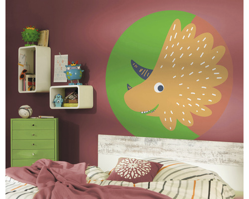 Kinderkamer met muursticker van dinosaurus, planken en bed