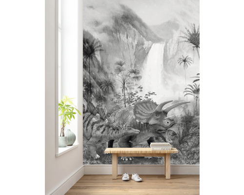 Zwart-wit fotobehang met dinosaurusmotief in kamer met zitbank en potplant