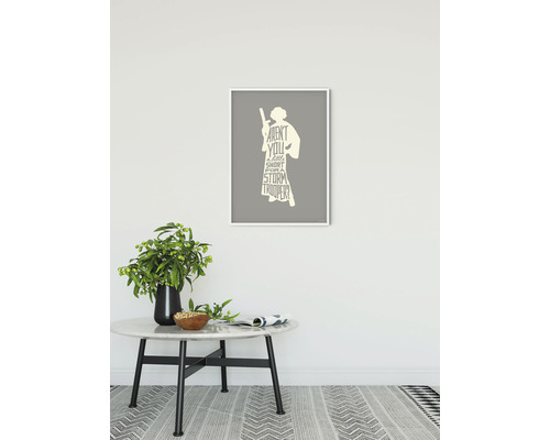 Ingelijste Star Wars wanddecoratie met Prinses Leia silhouet en citaat op een tafel met decoratie