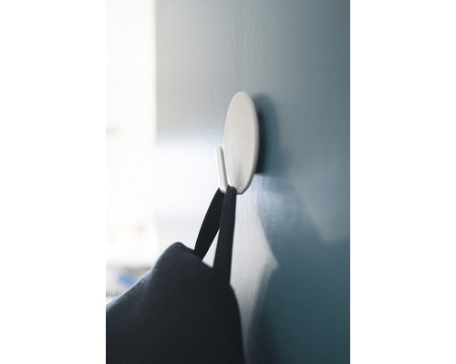 Muurhaak met opgehangen tas