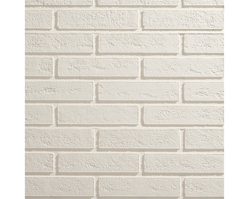 Close-up van een wandbekleding met baksteenmotief