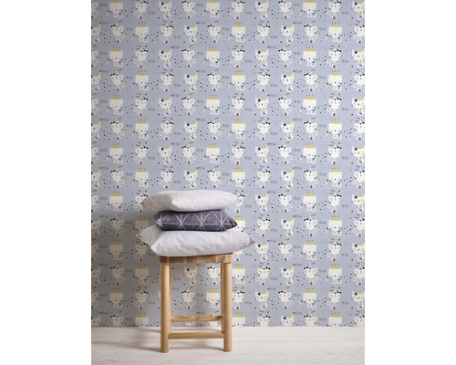 Behang met kattenmotief op een lichtblauwe achtergrond