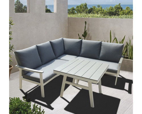 Tuinzitgroep met hoekbank en tafel op een terras