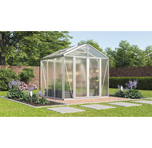 Tuinkas in de tuin met planten en tuinpad.