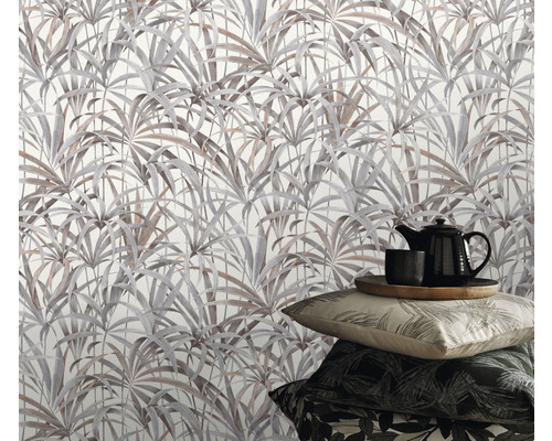 Scene met bladbehang, theepot en kussens