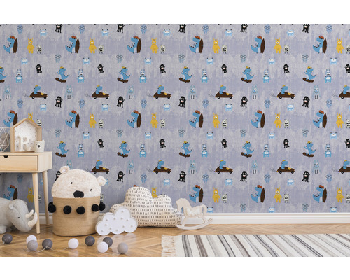 Kindertapete met dinosaurus- en monstermotieven in een heldere kinderkamer.