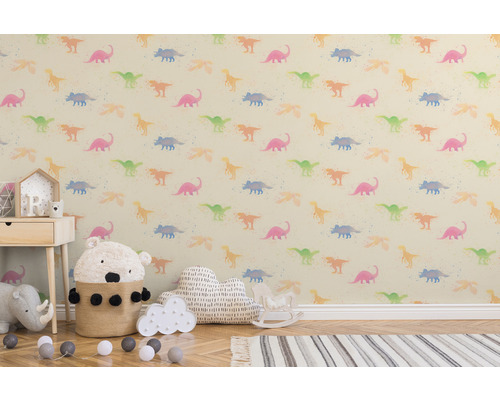 Kinderkamer met behang met dinosaurussenpatroon.