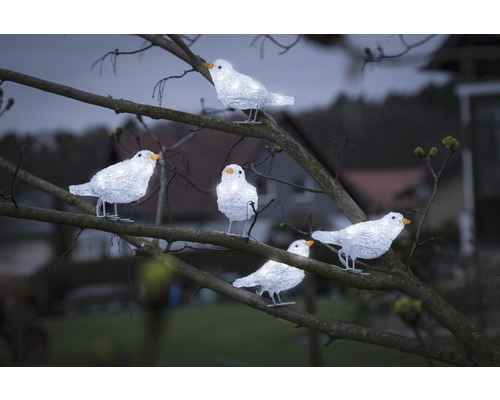 Decoratieve lichtfiguren vogels op een boom