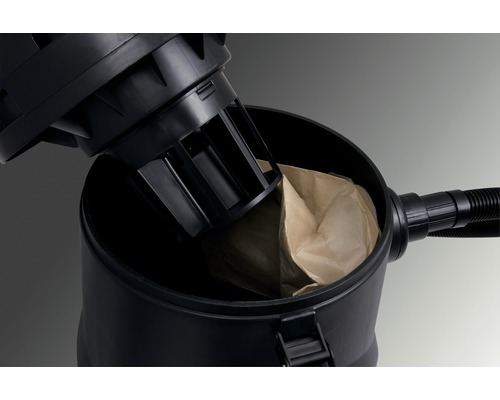 Binnenkant van een aszuiger met papieren zak