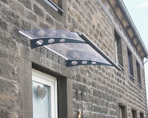 Entree overkapping met ronde uitsparingen in het frame