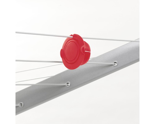 Droogmolen detailopname met rode koordhouder