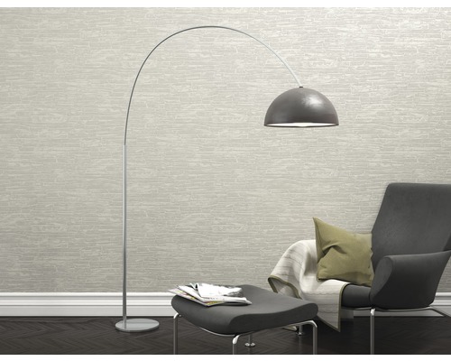 Leeshoek met booglamp, fauteuil en voetenbank