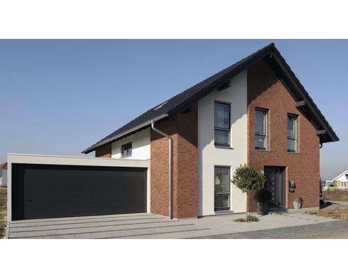 Moderne eengezinswoning met garage en bakstenen elementen