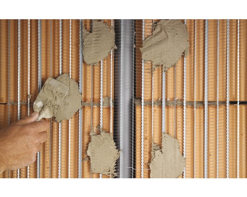 Buitenmuurisolatie met wapeningsmortel en weefsel