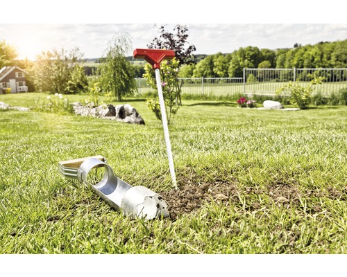 Grondboor voor tuinieren in het gras