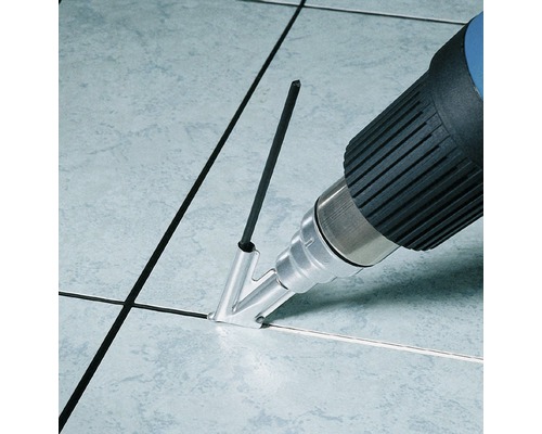 Heteluchtpistool met mondstuk voor het voegen van tegels