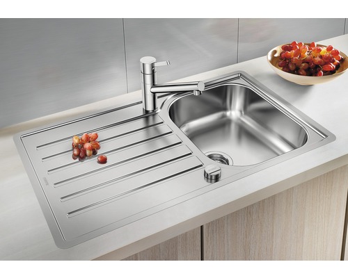 Roestvrijstalen spoelbak met afdruiprek en kraan