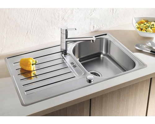 Spoelbak van roestvrij staal met afdruiprek en kraan
