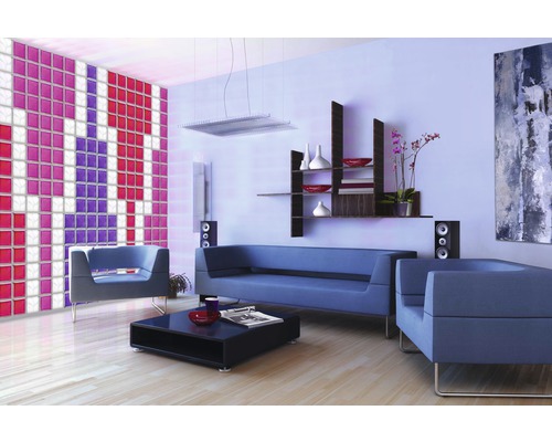 Woonkamer met glazen bouwsteenmuur, bank en fauteuil