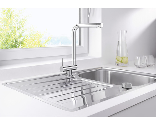 Roestvrijstalen spoelbak met kraan en afdruiprek