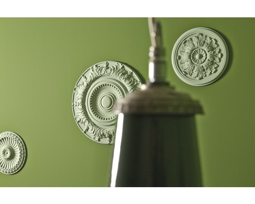 Decoratieve rozetten op een muur