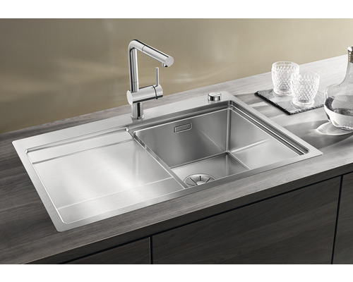 Roestvrijstalen spoelbak met afdruiprek en kraan