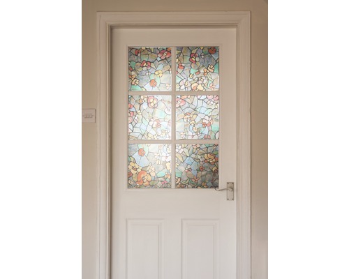 Witte deur met decoratieve glasfolie met bloemmotief