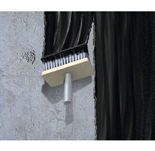 Borstel brengt afdichting aan op een muur